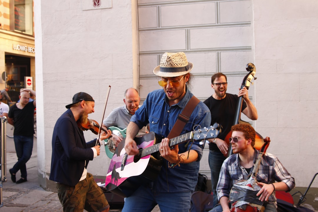 group-of-men-playing-musical-instruments-0cabf4q3oja